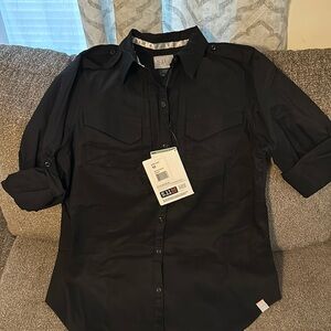 Brand new women’s black spitfire shooting shirt